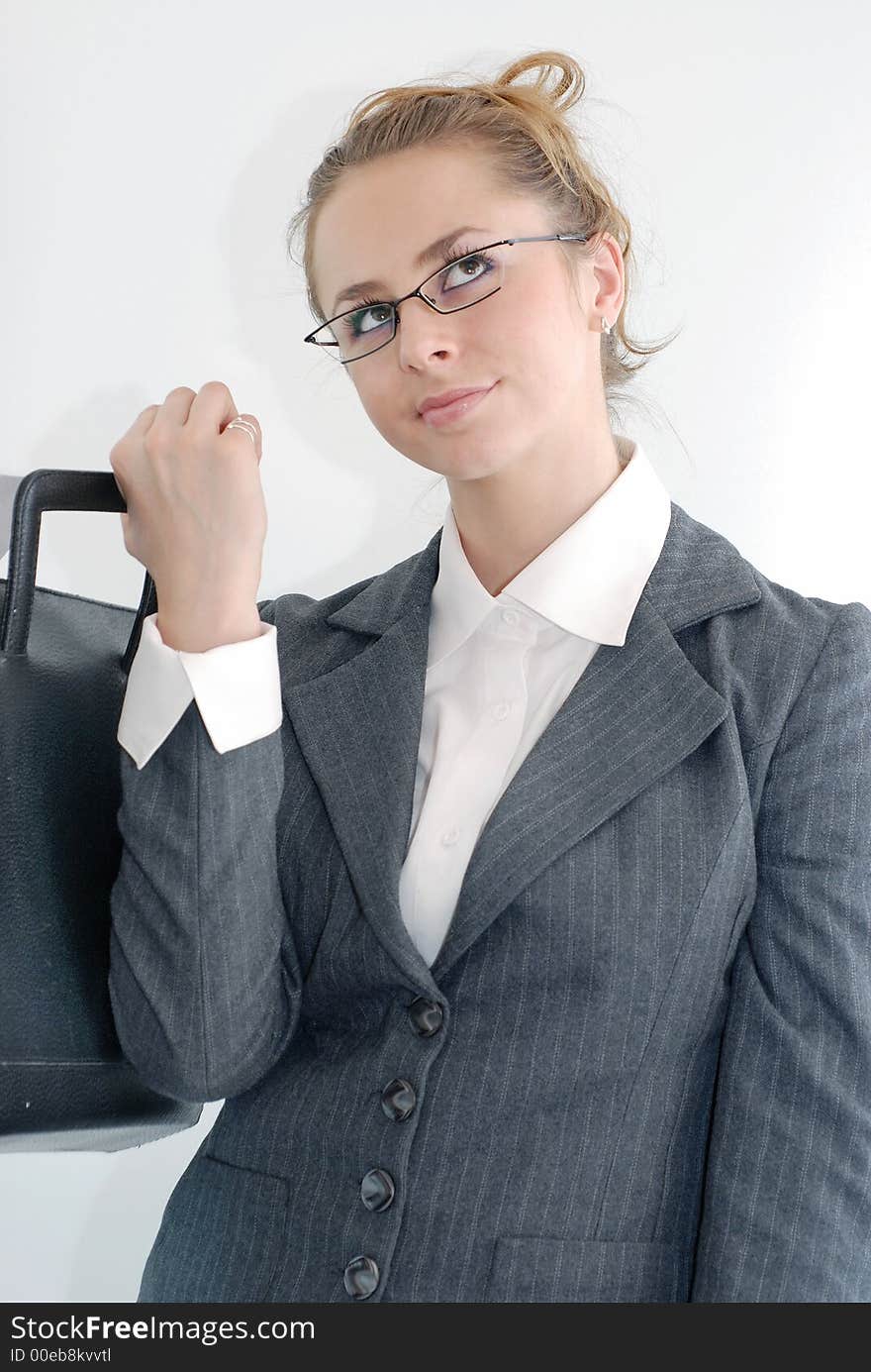 Woman in office looking up. Woman in office looking up