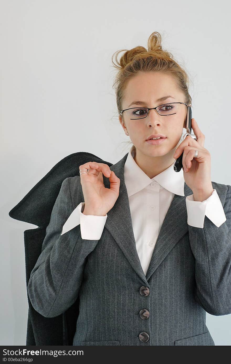 Young office woman with phone. Young office woman with phone