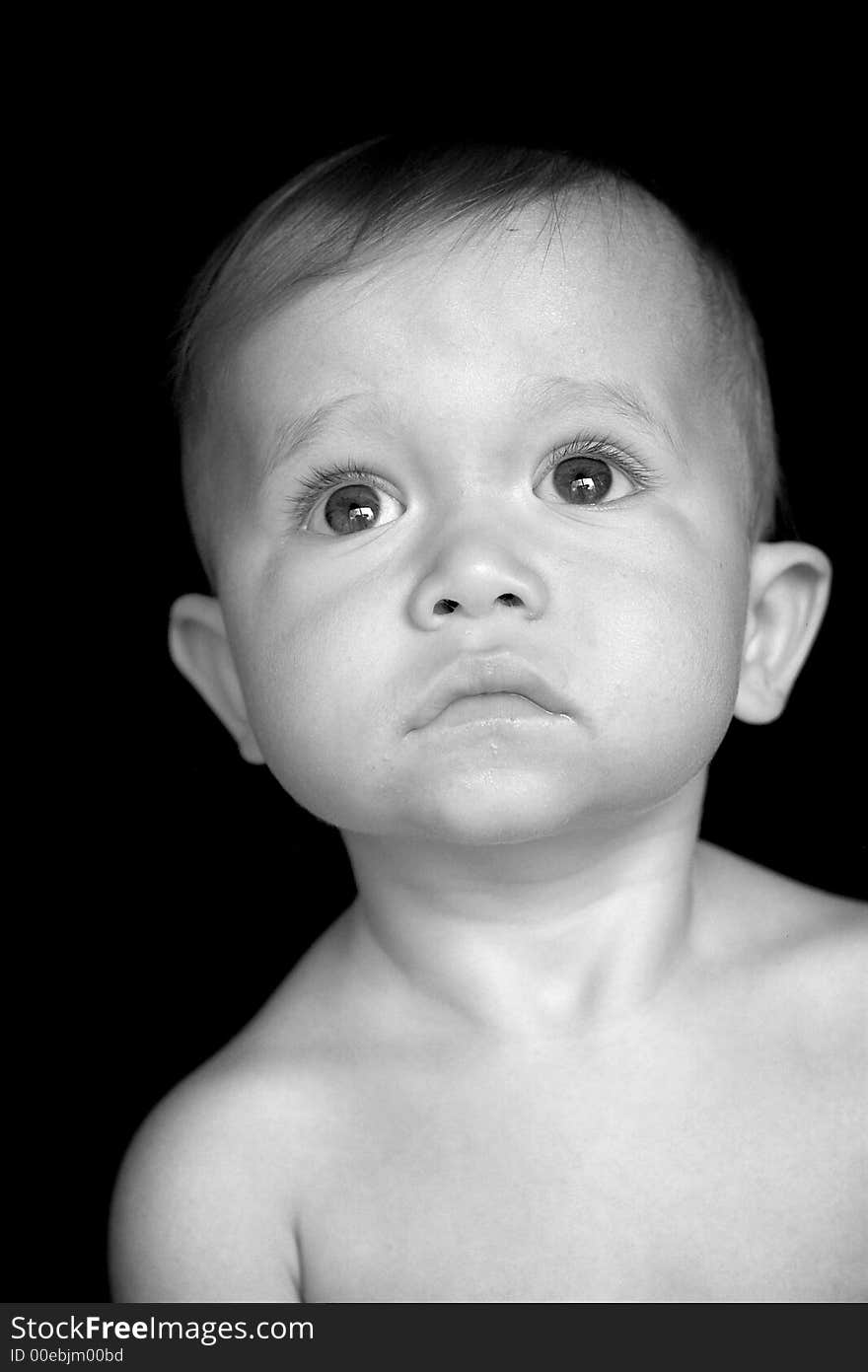 Black and white image of beautiful 10 month old baby boy. Black and white image of beautiful 10 month old baby boy