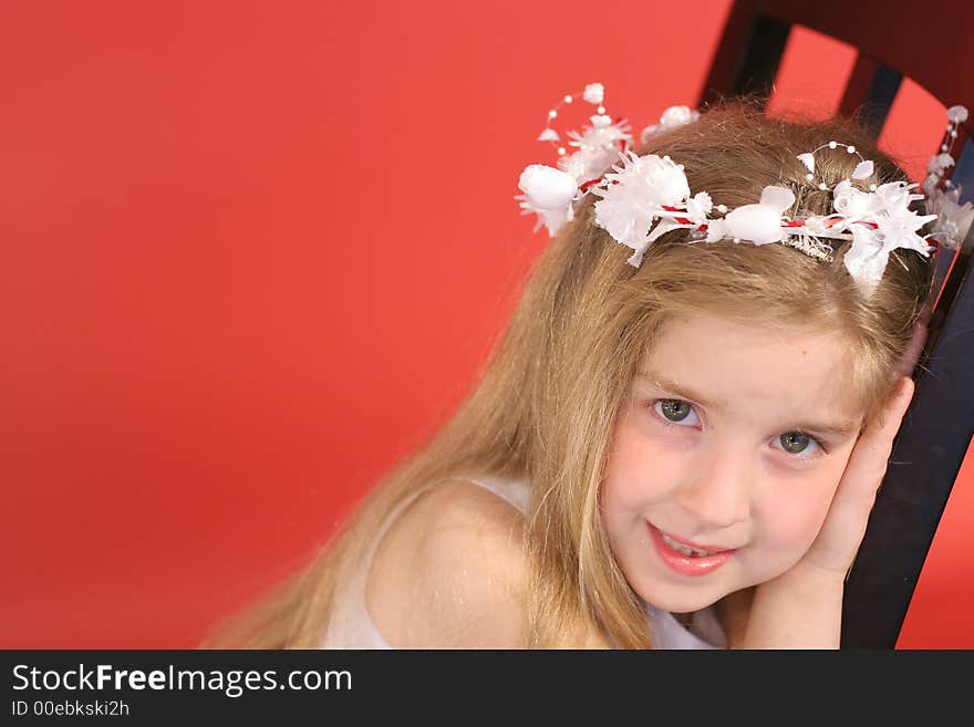 Flower girl in chair