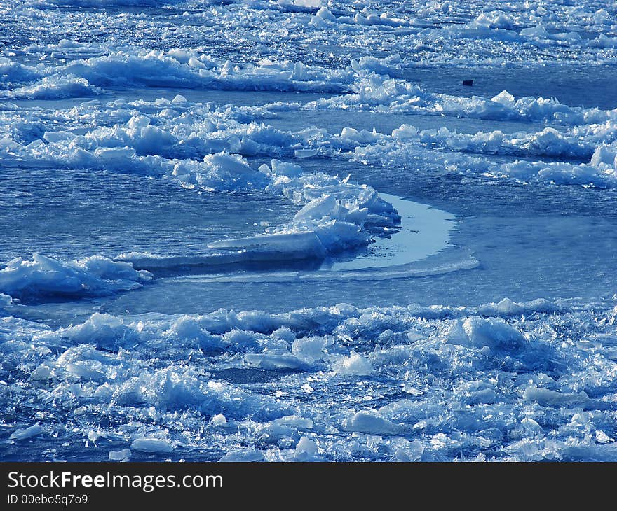 River covered with ice at early spring time. River covered with ice at early spring time