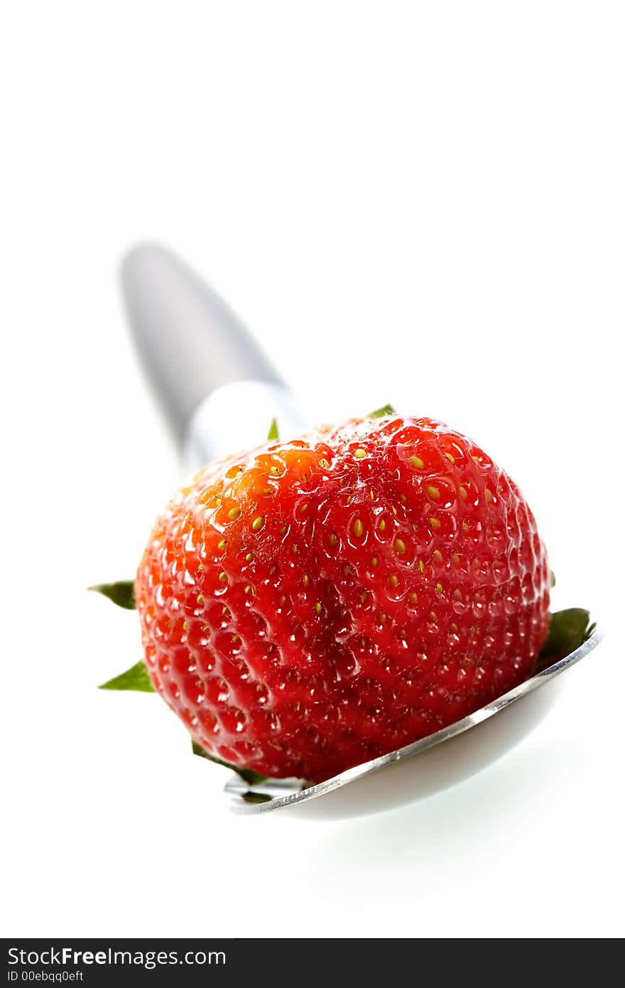 Delightful strawberry in strict laying on the spoon. Delightful strawberry in strict laying on the spoon