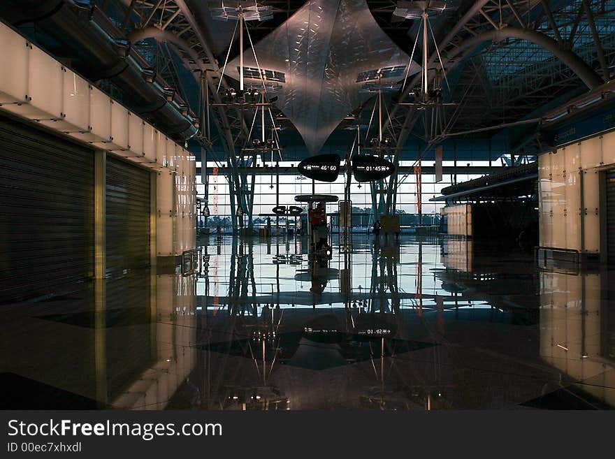 People silhouette in the waiting lounge in airport