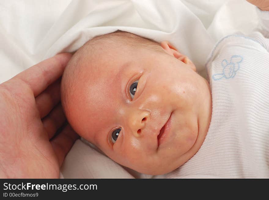 Newborn child on white background. Newborn child on white background