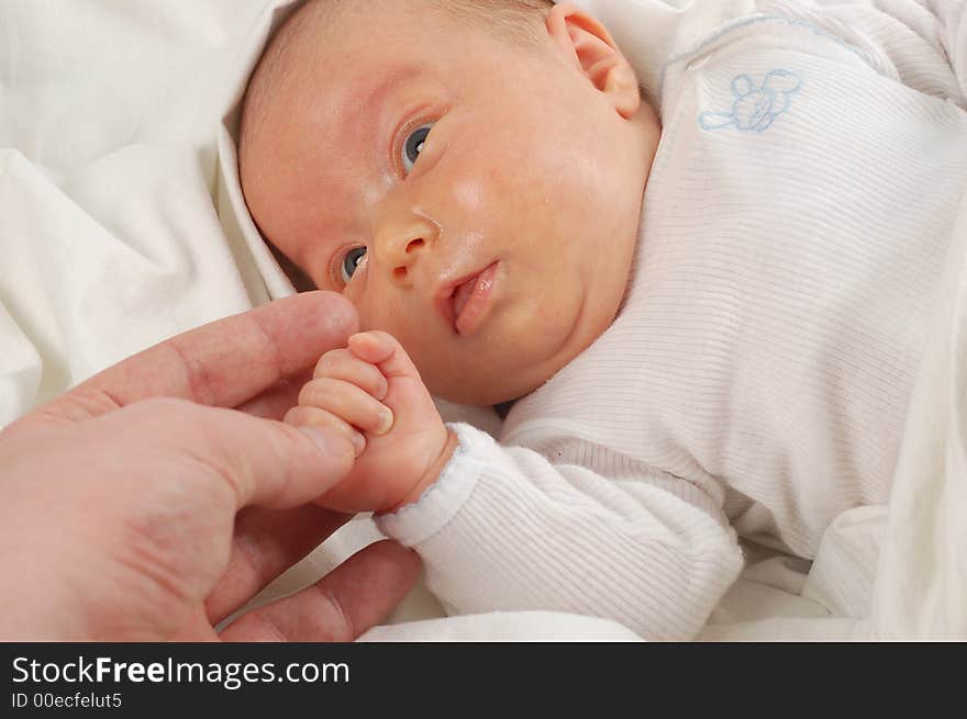 Newborn child on white background. Newborn child on white background