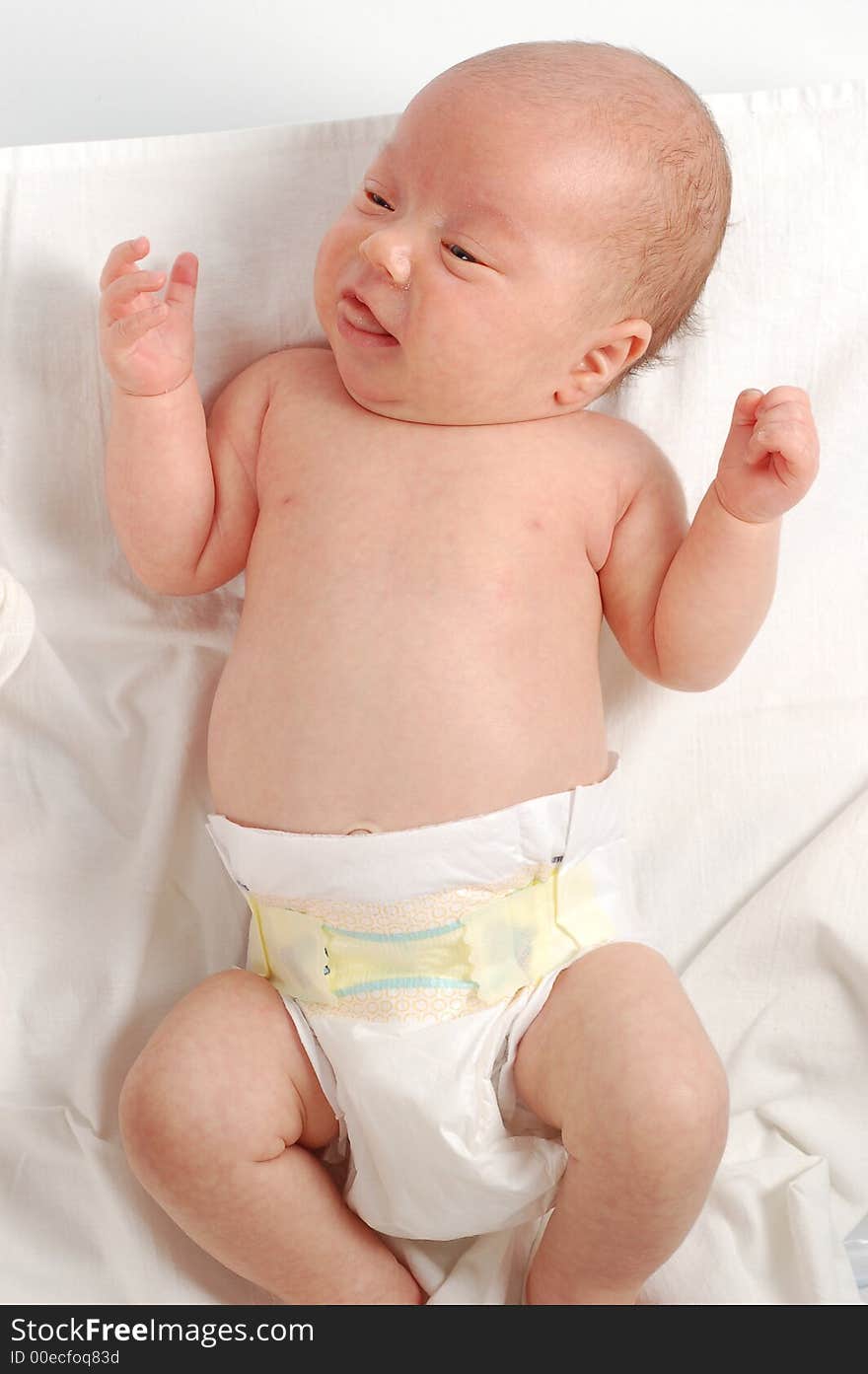 Newborn child on white background. Newborn child on white background