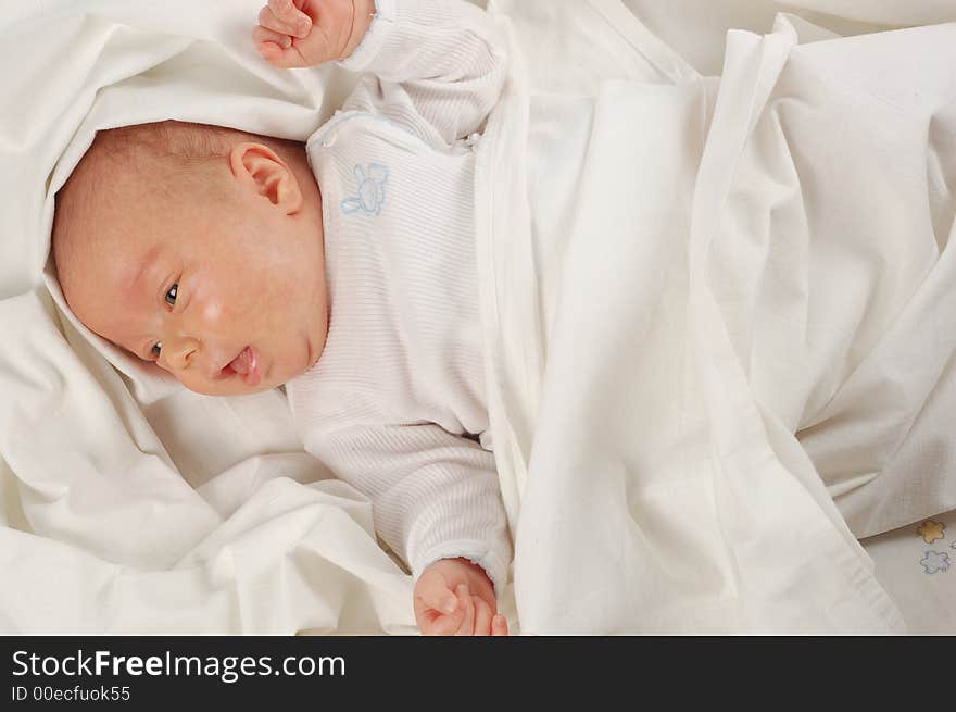 Newborn child on white background. Newborn child on white background