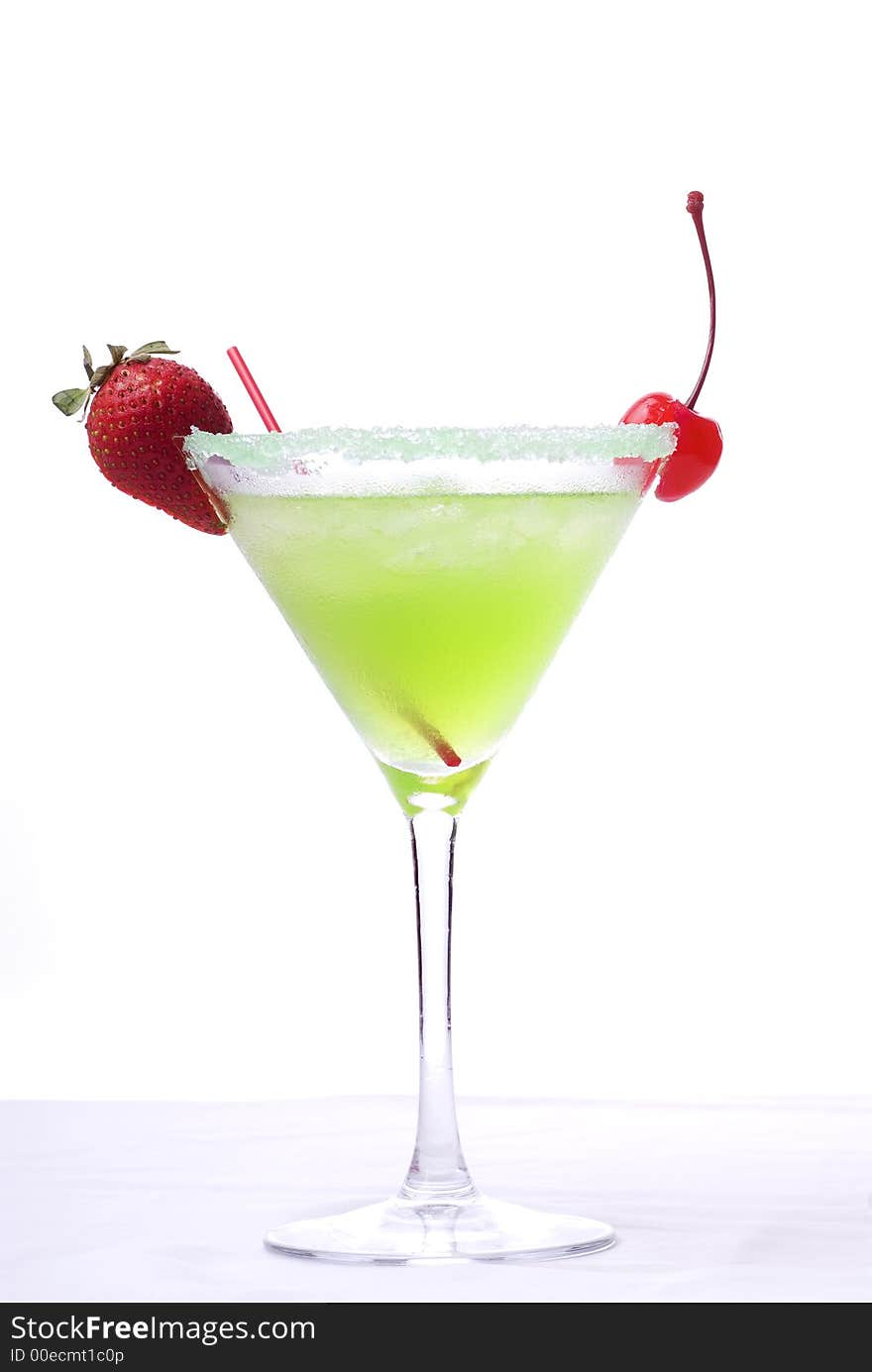 Colorful alcoholic cocktail in a martini glass against white background. Colorful alcoholic cocktail in a martini glass against white background