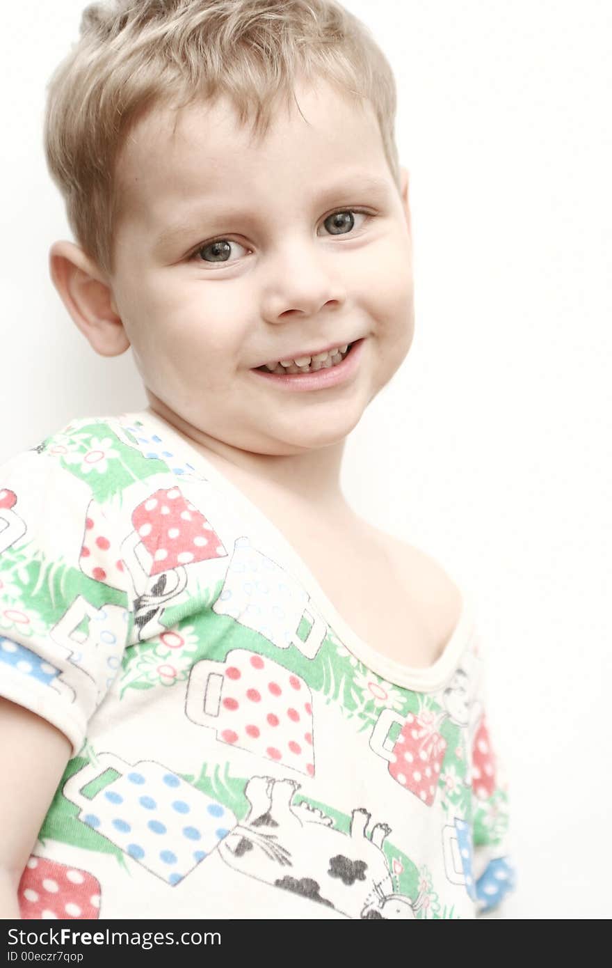 The happy boy on a white background