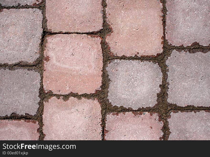 Texture of paving - stone tile pattern with wet cement after the rain. Texture of paving - stone tile pattern with wet cement after the rain.