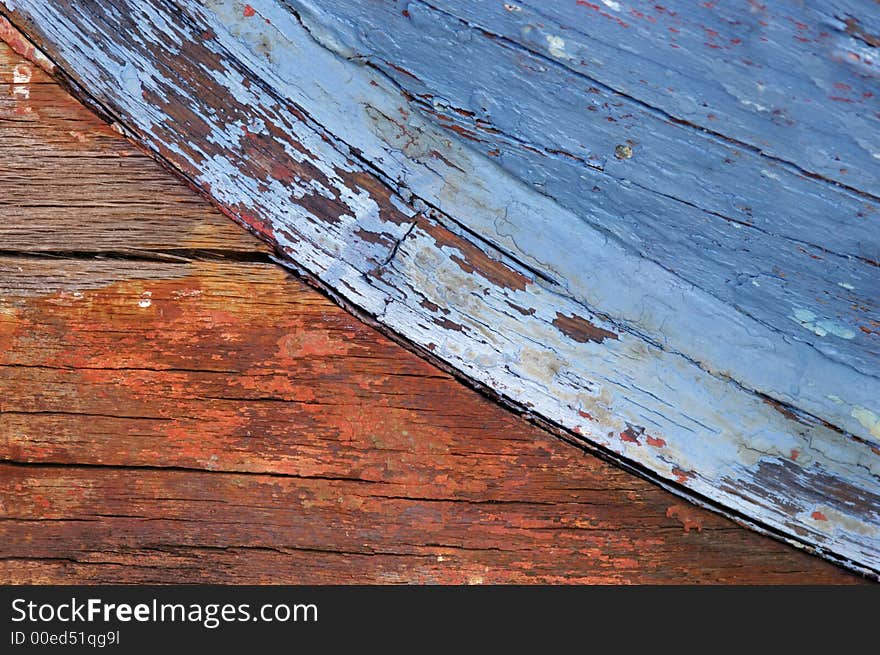 Interesting texture and colors from bottom of old wooden boat. Interesting texture and colors from bottom of old wooden boat.