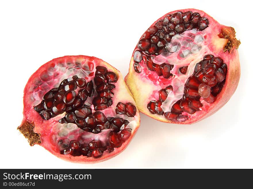 Two halfs of ruby pomegranate