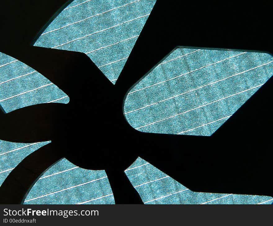 French curve on the striped paper background.