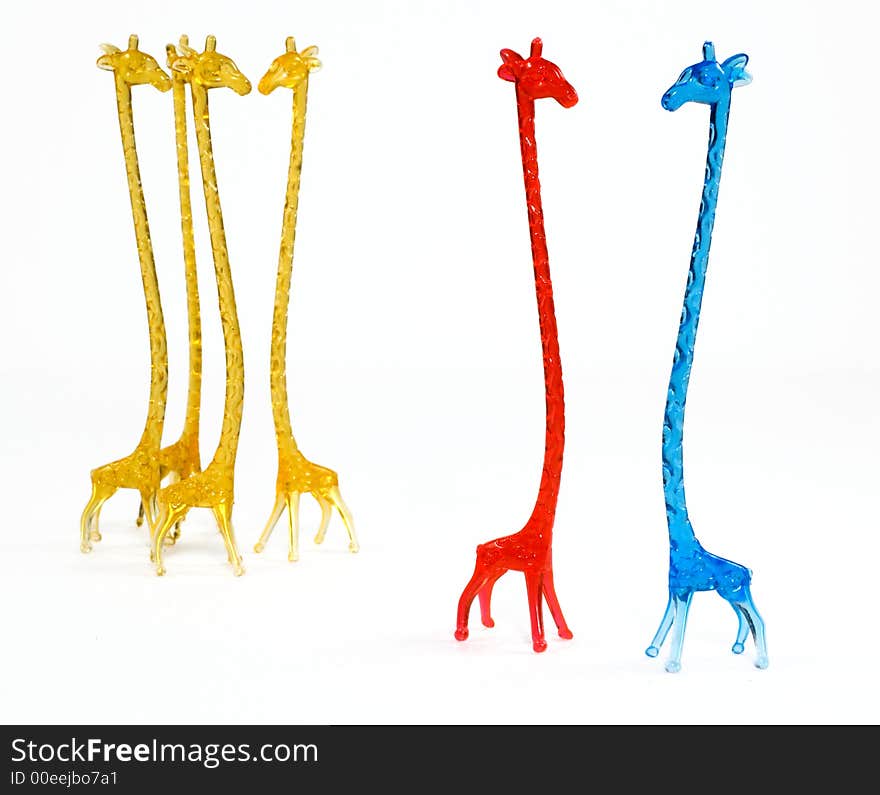 Set of glass colorful giraffes figurines. Set of glass colorful giraffes figurines