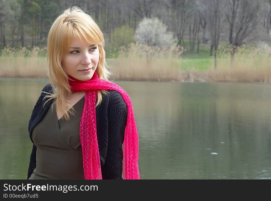 Lnely girl on the lake.