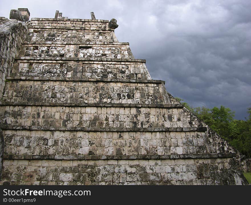 The side of a temple in Chichen Itza, Mexico. The side of a temple in Chichen Itza, Mexico.