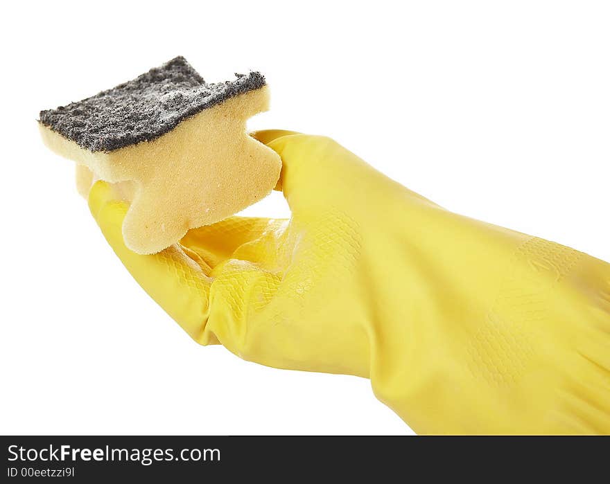 Hand in yellow rubber glove with yellow sponge and foam. Hand in yellow rubber glove with yellow sponge and foam