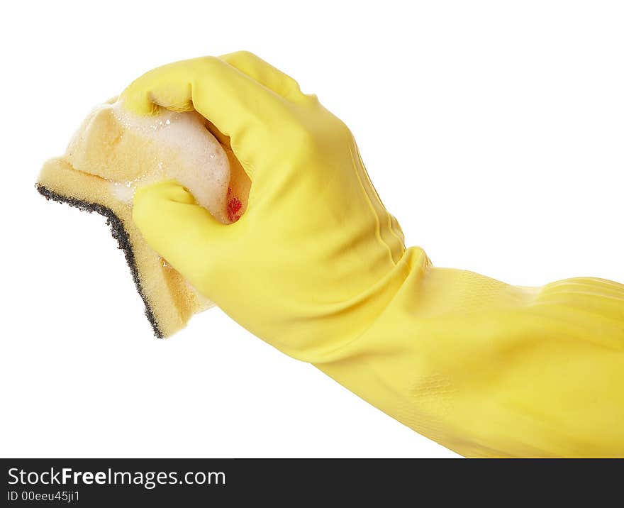 Hand in yellow rubber glove with yellow sponge and foam. Hand in yellow rubber glove with yellow sponge and foam