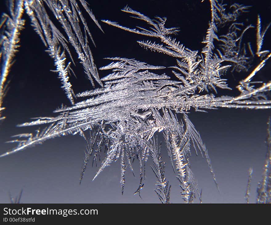 Frozen water on the window. Frozen water on the window