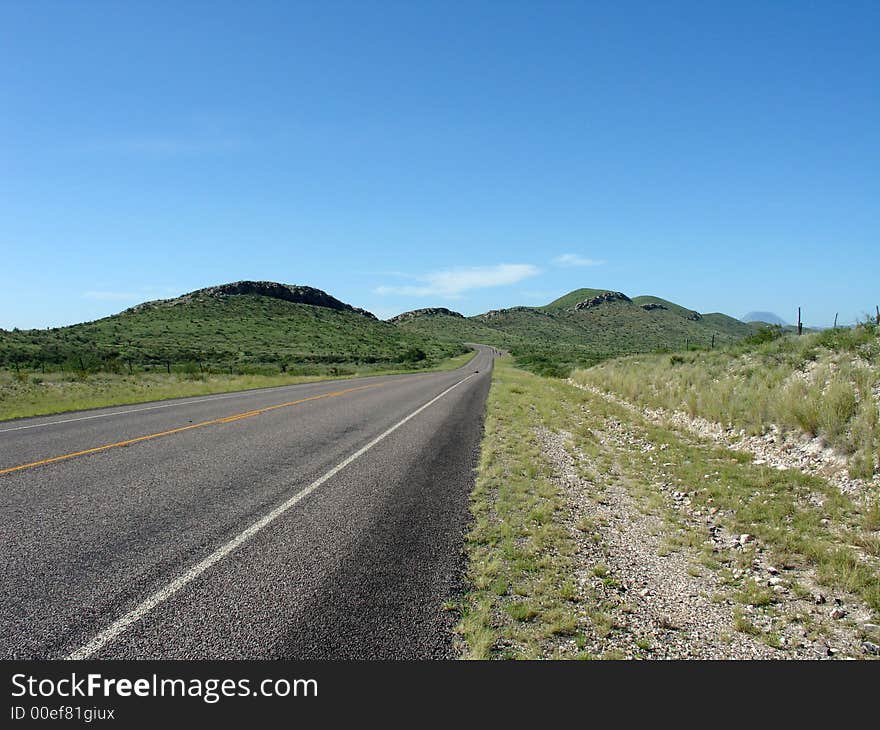 A straight road leading to Big Bend national park