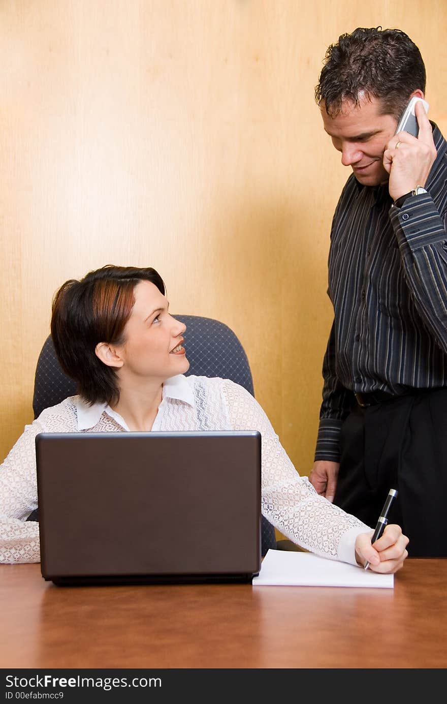 Two business colleagues in a boardroom in a meeting