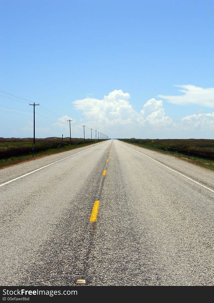 A straight road leading to nowhere in Texas