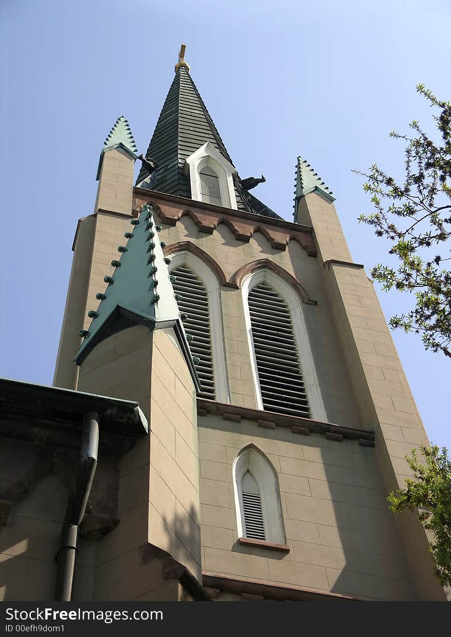 Historic Church looking up at blue sky. Historic Church looking up at blue sky