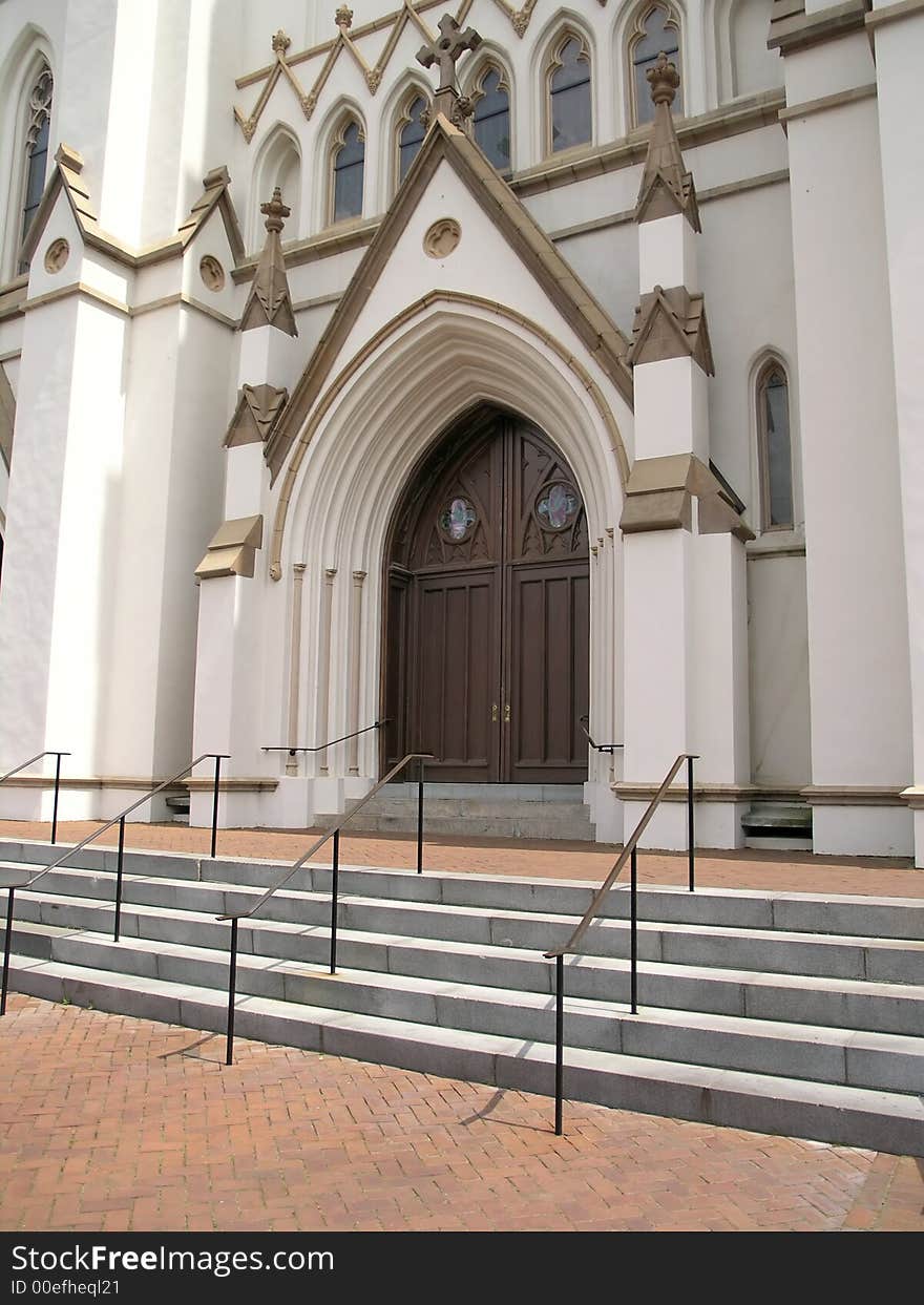 Historic ornate white Church Arched Door with steps. Historic ornate white Church Arched Door with steps