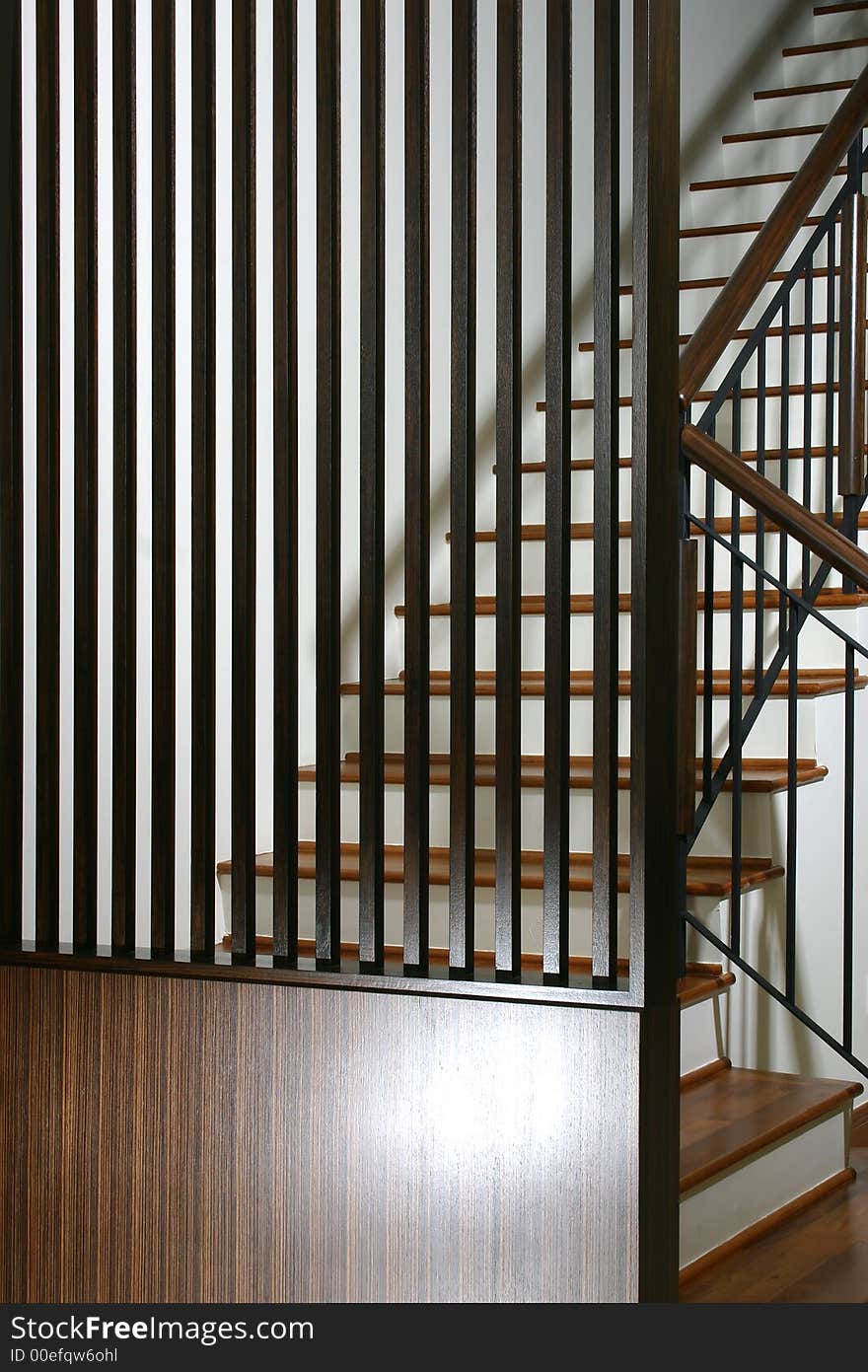 Staircase with feature wall design in timber stripes finishes