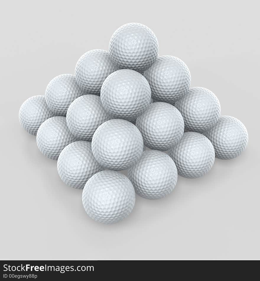 Golf ball pyramid stack on gray background