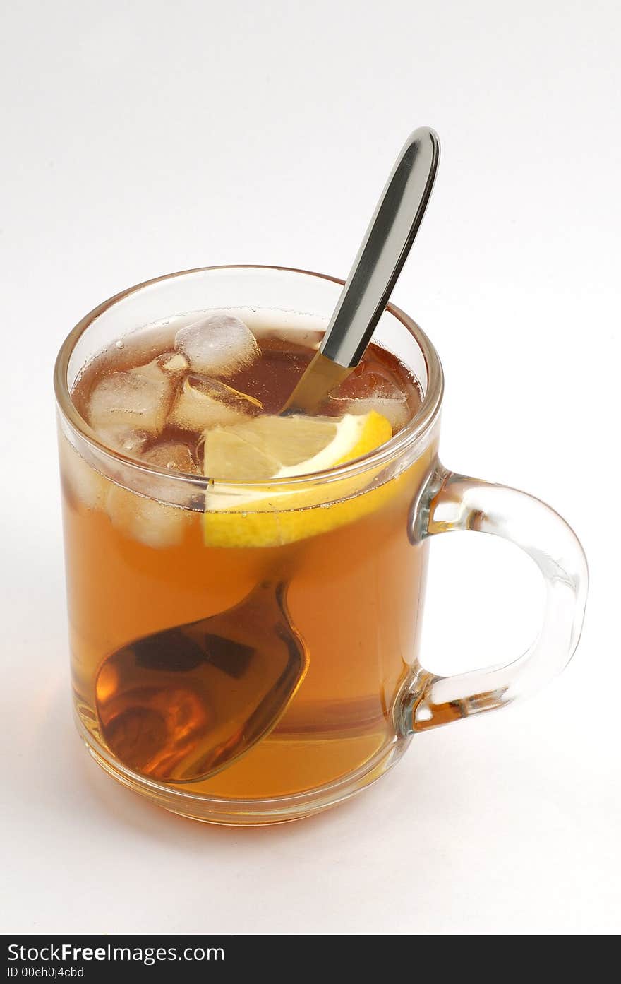 Cup of tea with ice isolated on white