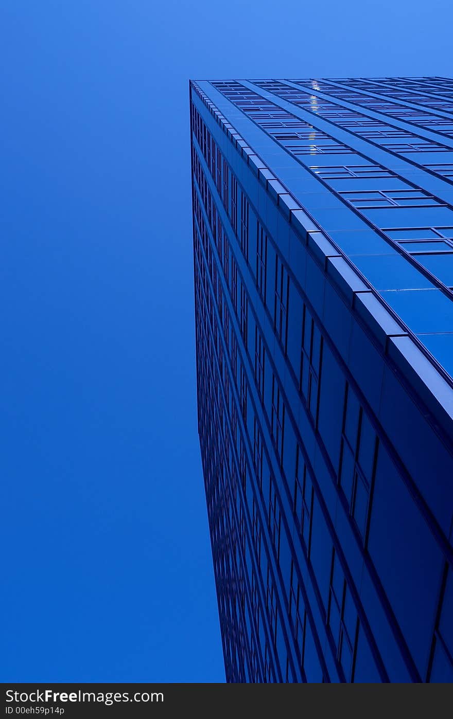 BIG blue building and a nice blue sky.