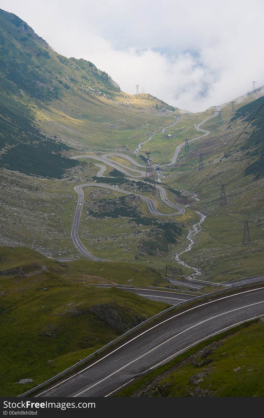 Roads on the mountains in a cloudy day. Roads on the mountains in a cloudy day