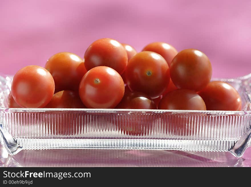 Cherry tomatoes in a glass bowl