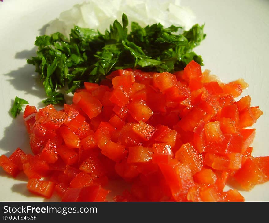 Salad made of pepper, parsley and onion