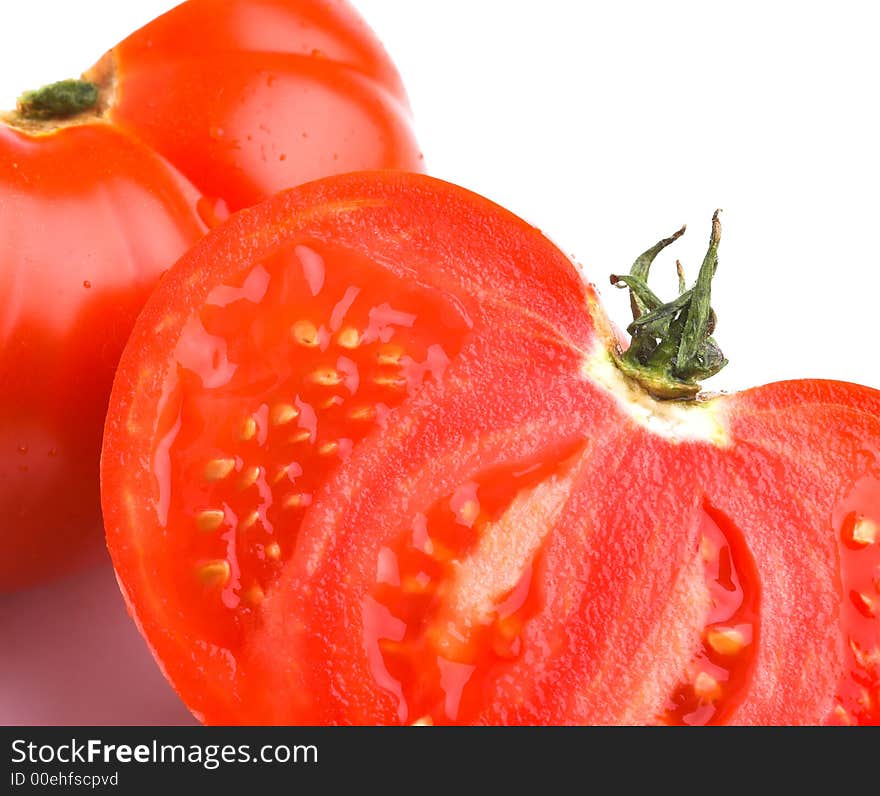 Sliced tomatoes against a white background