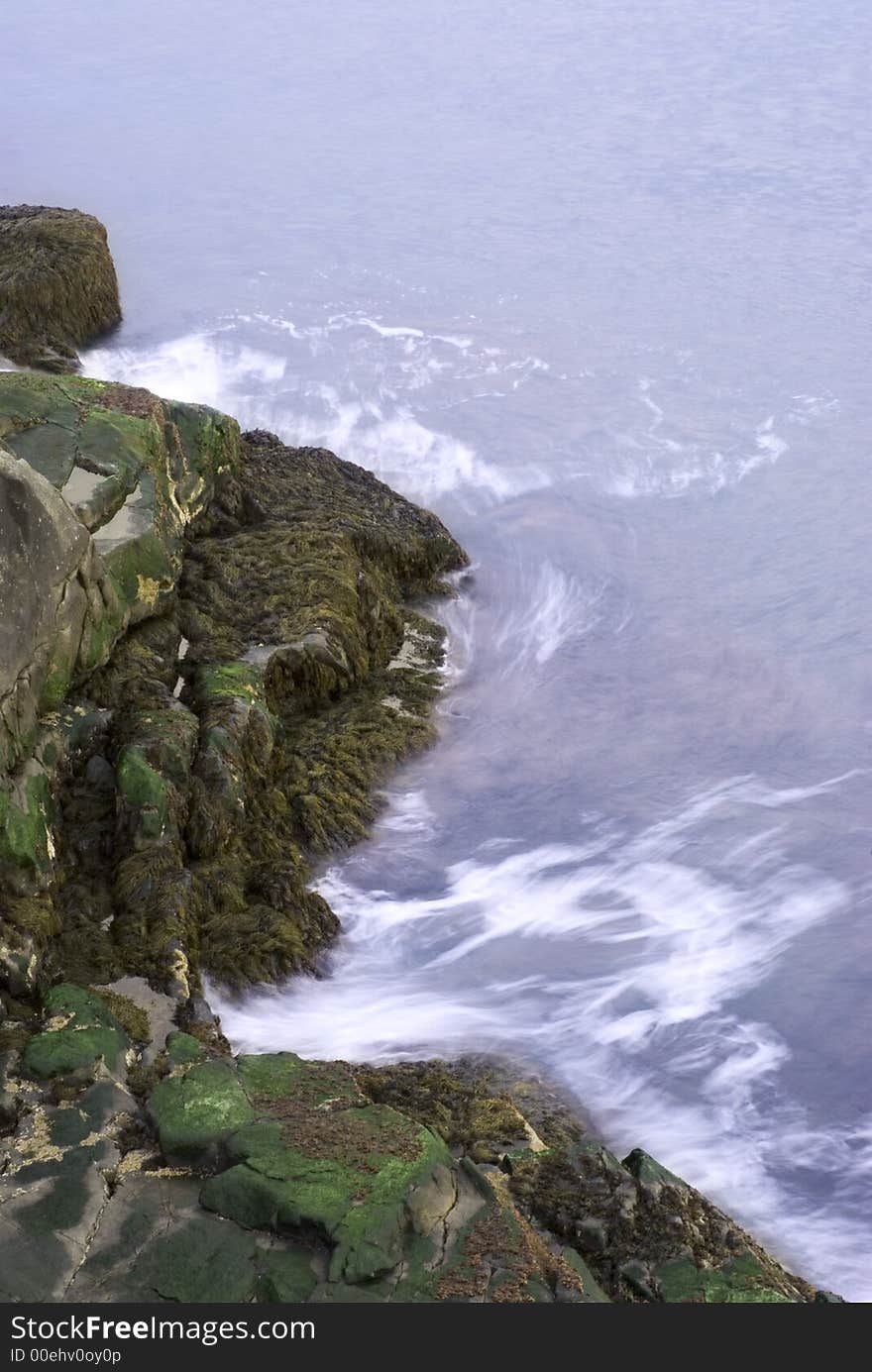 Water crashing into rocks on the coast of Maine. Water crashing into rocks on the coast of Maine