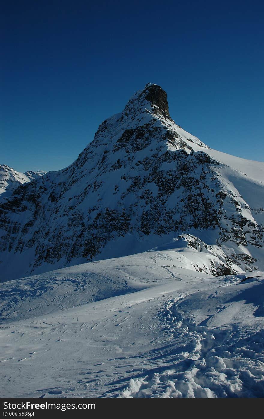 The snowy, rocky peak of one of BC's Monashee Mountains. The snowy, rocky peak of one of BC's Monashee Mountains.