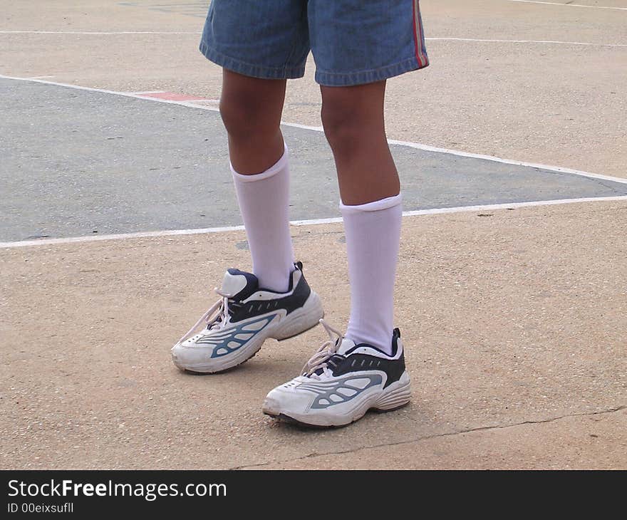 Side profile of a boy's legs. Side profile of a boy's legs