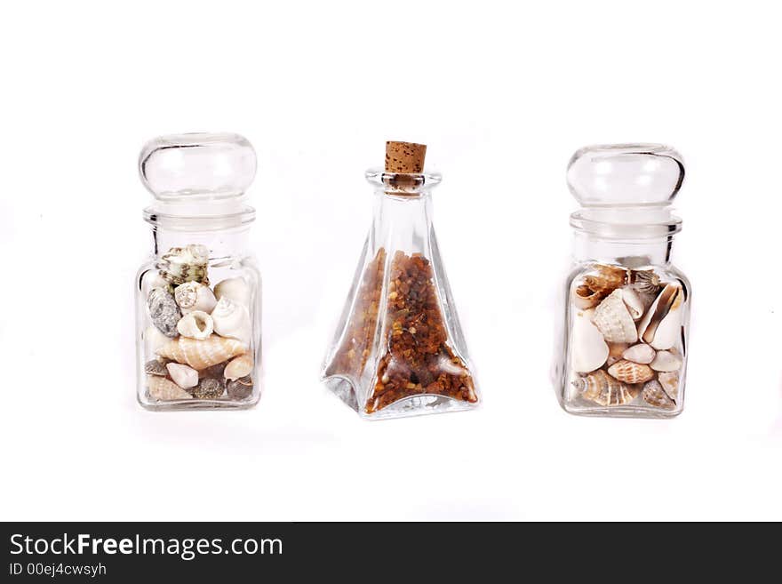 Amber and shells on white background