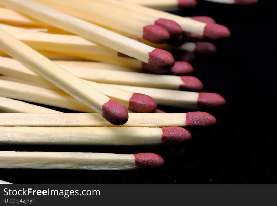 Close-up of group of matches, black background