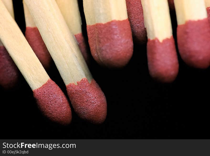 Close-up of group of matches, black background