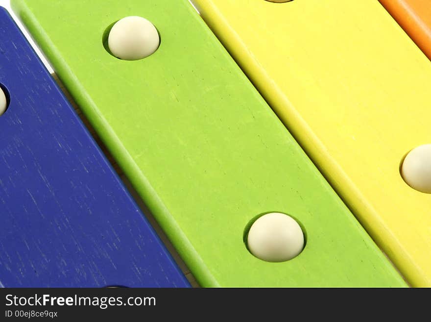 Childs colourful xylophone and beater