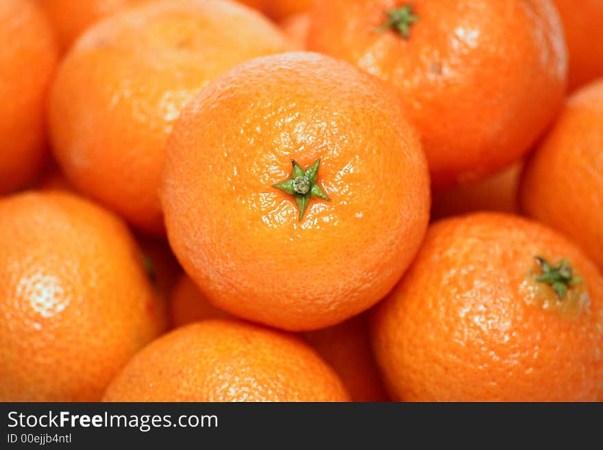 A lot of juicy tasty an orange close up. A lot of juicy tasty an orange close up