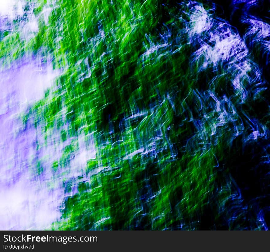 An abstract image created by using a slow shutter speed while moving the lens.  Colors added and adjusted afterwards. An abstract image created by using a slow shutter speed while moving the lens.  Colors added and adjusted afterwards.