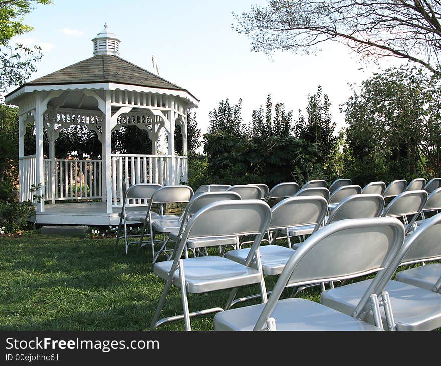 Seats set up for an outdoor wedding. Seats set up for an outdoor wedding.