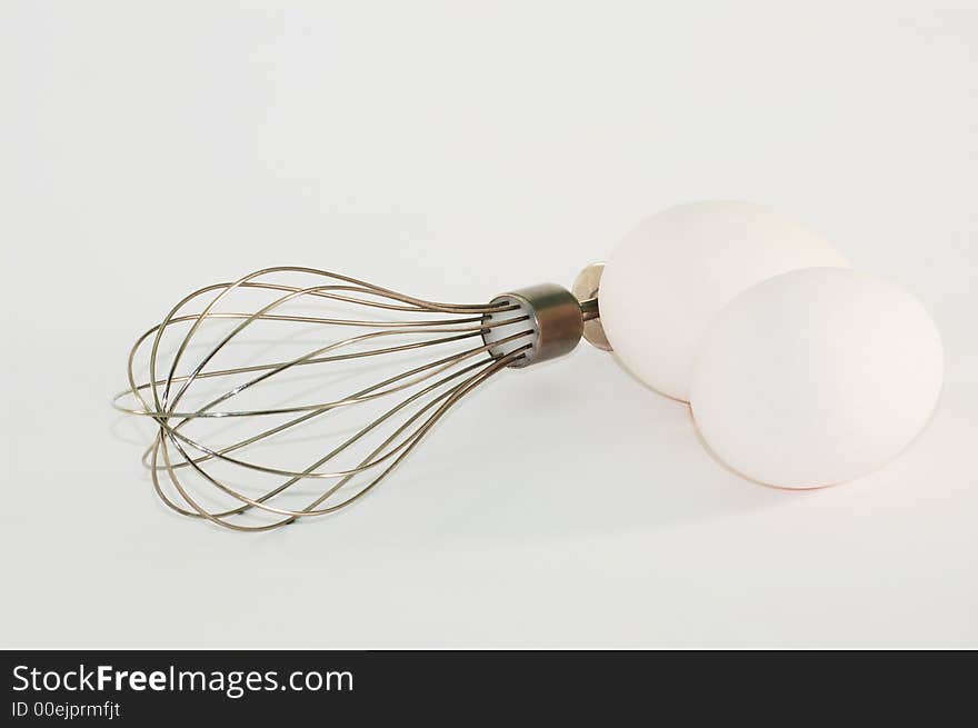 Eggs and whisk