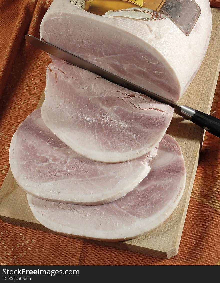 Slicing a white ham