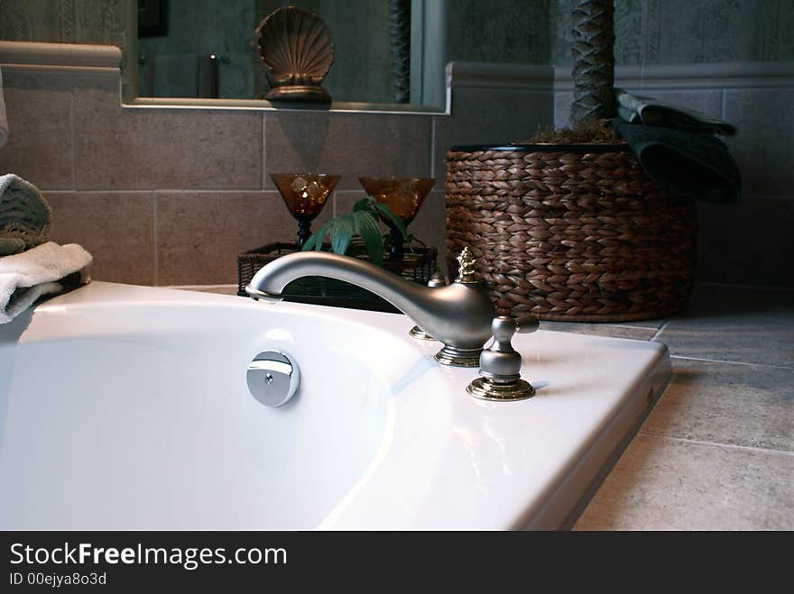 New bathroom faucet with nice basket on the side