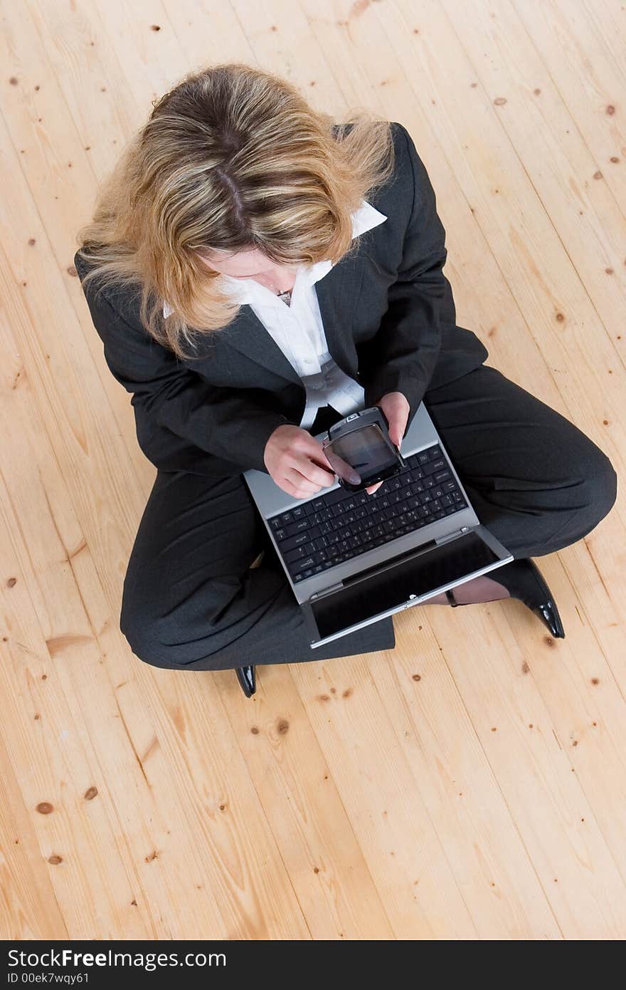 A woman sitting cross legged